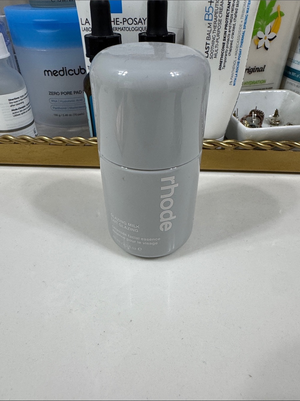 RHODE Balancing Milk Facial Essence - Light Gray Bottle-full. Used once